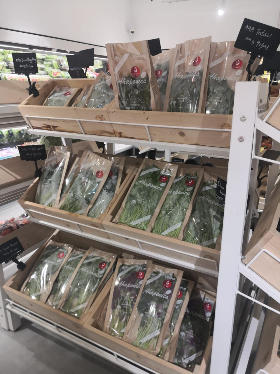 Freshly packed AHA vegetables on a retail shelf